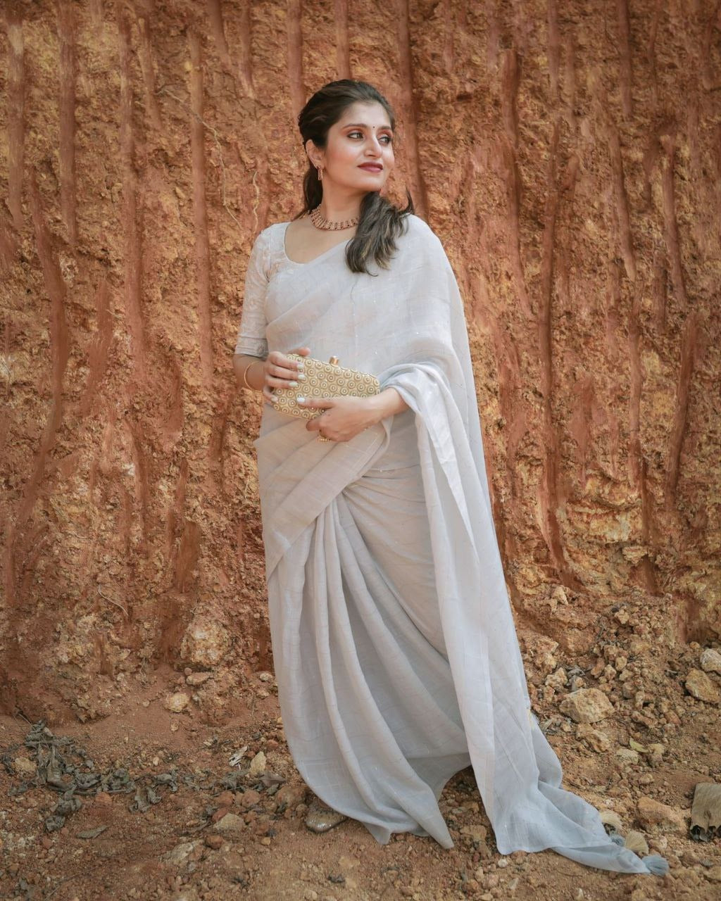 Soft linen saree with woven chex and woven sequence allover